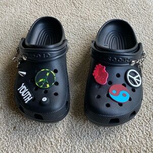 NWOT CROCS with Peace and Lock on a Chain in Size 8. Additionally, 7 Jibbets